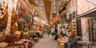 Colorful street scene in Marrakech Old Medina with traditional architecture